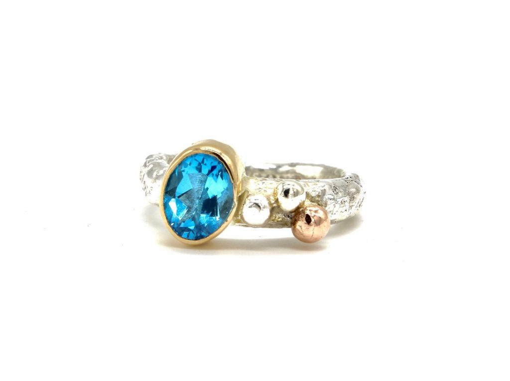 gold and silver topaz ring