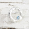 silver halo ring with topaz