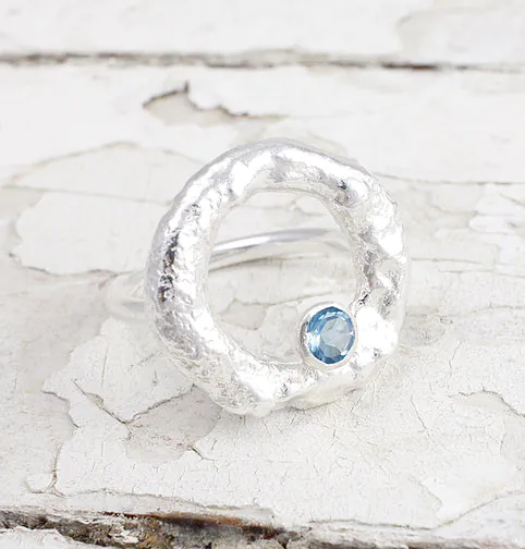 silver halo ring with topaz